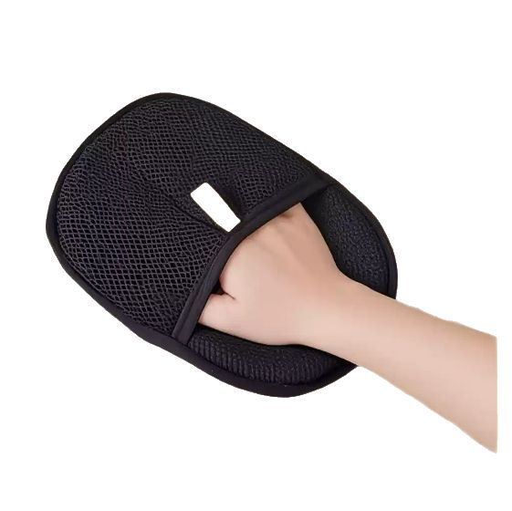 Deshedding glove used on a dog